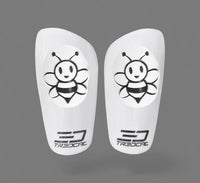 Pair of white shin guards with 3D bee design and Tredcal logo