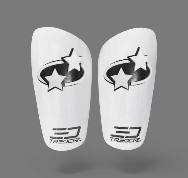 Pair of soccer shin guards with 3D dizzy star logo design on TREDCAL brand shin guards