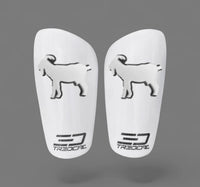 A pair of TREDCAL brand soccer shin guards with patented 3D GOAT logo.