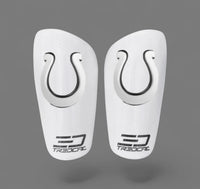 A pair of TREDCAL brand soccer shin guards with patented 3D horse shoe logo.