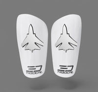 A pair of TREDCAL brand soccer shin guards with patented 3D jet logo.