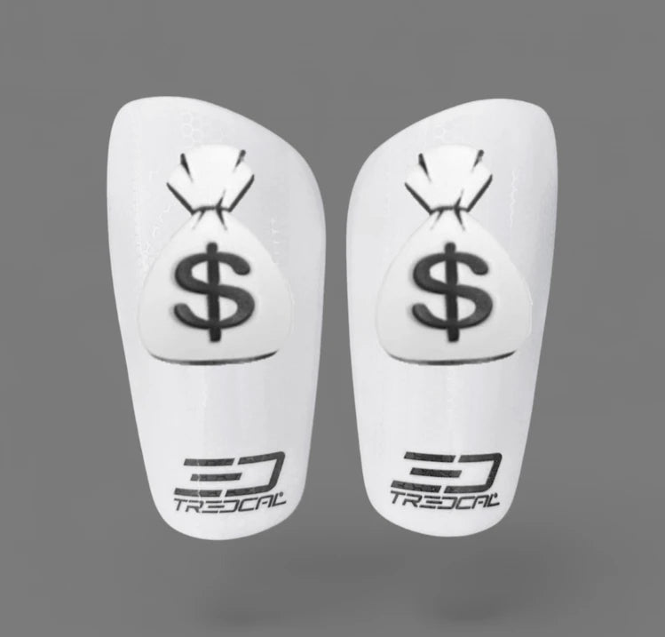 A pair of TREDCAL brand soccer shin guards with patented 3D Money Bag logo.