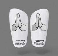 Pair of white prayer hands shin guards with TREDCAL lack branding
