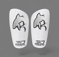 A pair of TREDCAL brand soccer shin guards with patented 3D shark logo.