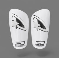 Pair of white soccer shin guards with 3D shooting star design on Tredcal brand shin guards