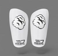 Pair of white soccer shin guards with 3D logos on TREDCAL guards