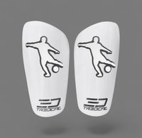 A pair of TREDCAL brand soccer shin guards with patented 3D soccer player logo.