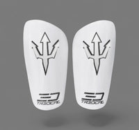 A pair of TREDCAL brand soccer shin guards with patented 3D trident/pitch fork logo.